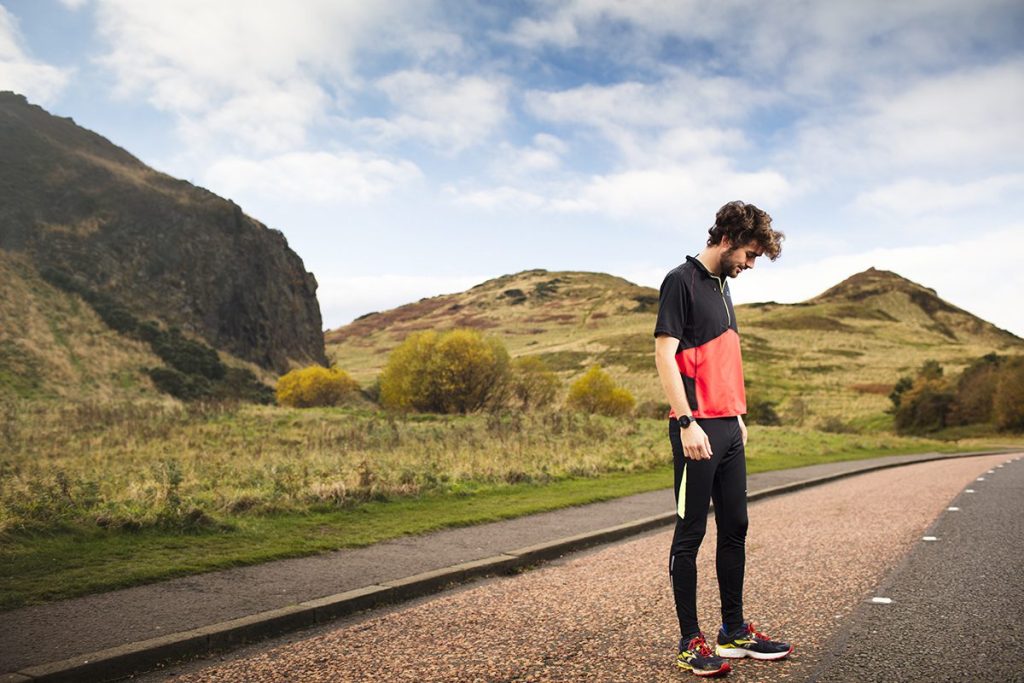 Editorial Photography of a runner at Arthurs seat in edinburgh